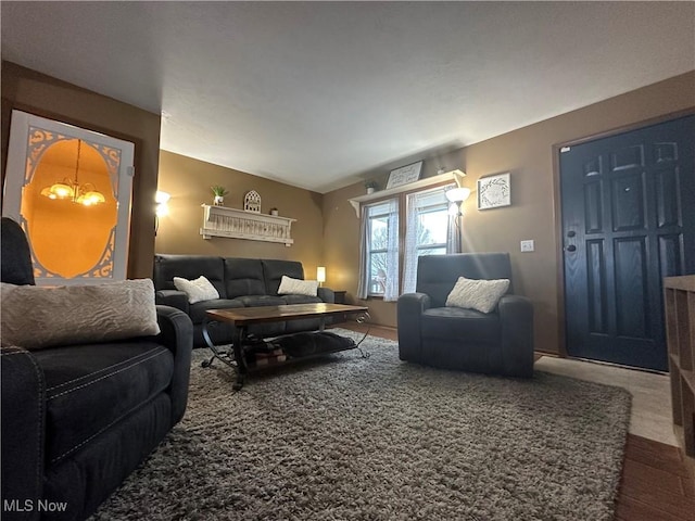 living room with a notable chandelier