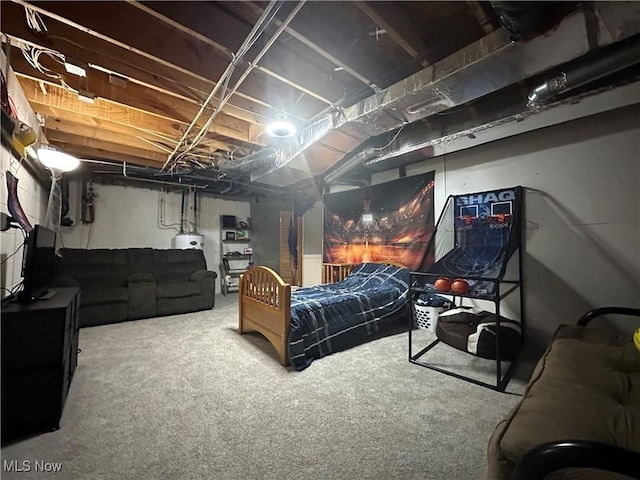 basement with water heater and carpet