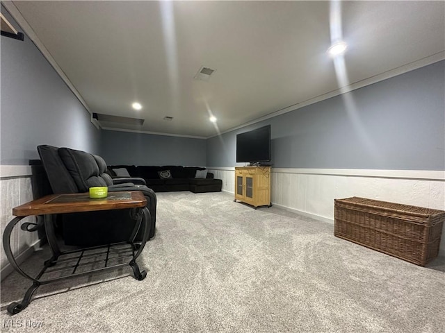 living room with carpet and ornamental molding