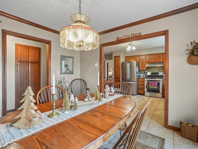 dining space featuring light tile patterned flooring and crown molding