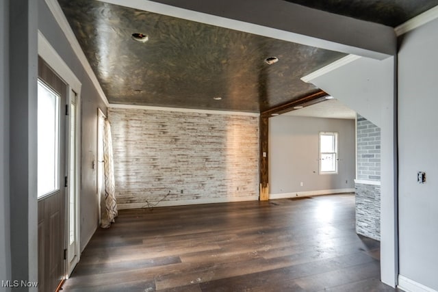 unfurnished living room featuring dark hardwood / wood-style floors