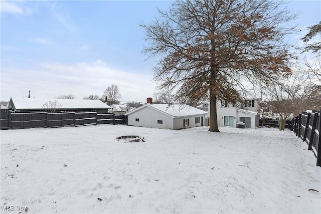 view of yard covered in snow