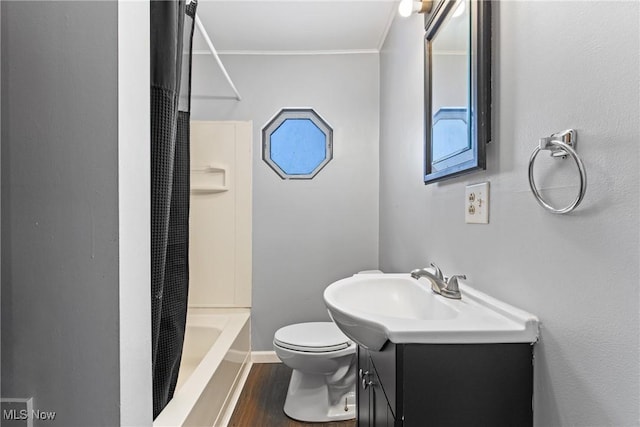 full bathroom featuring vanity, shower / bath combo, crown molding, toilet, and wood-type flooring