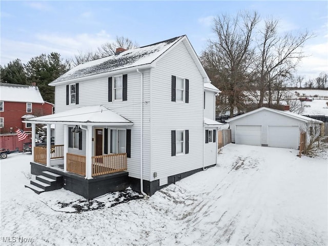 view of front of property featuring an outbuilding, covered porch, and a garage