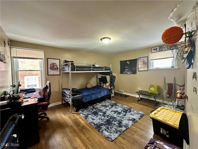 bedroom featuring wood-type flooring