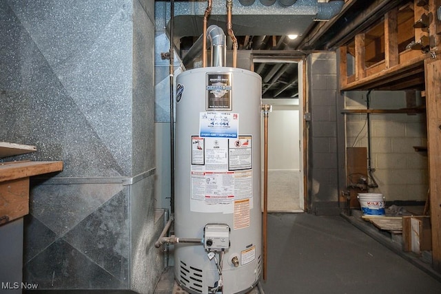 utility room featuring heating unit and water heater