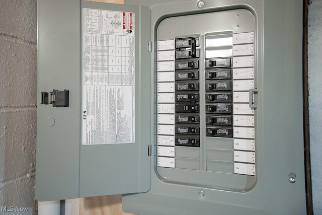 utility room featuring electric panel