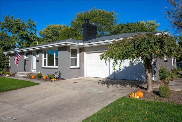 ranch-style home featuring a garage