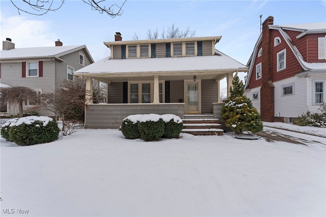 bungalow-style home with covered porch