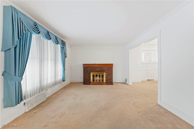 unfurnished living room featuring crown molding, a fireplace, and light carpet