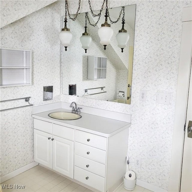 bathroom featuring tile patterned floors and vanity