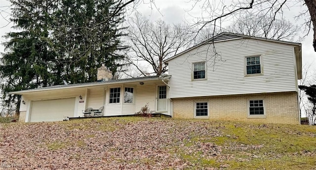 tri-level home featuring a garage