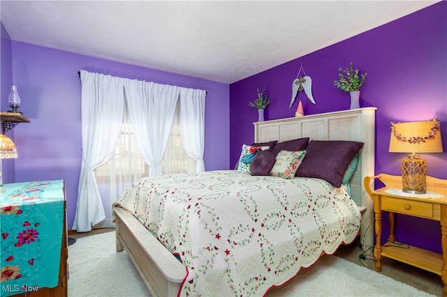 bedroom featuring carpet floors