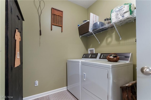 laundry room with independent washer and dryer