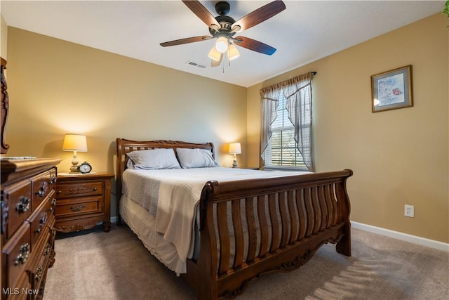 carpeted bedroom featuring ceiling fan