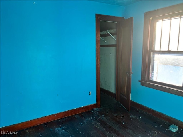 unfurnished bedroom featuring a closet