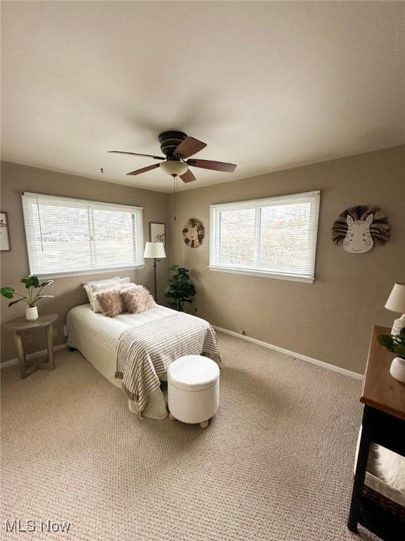 bedroom featuring carpet flooring and ceiling fan