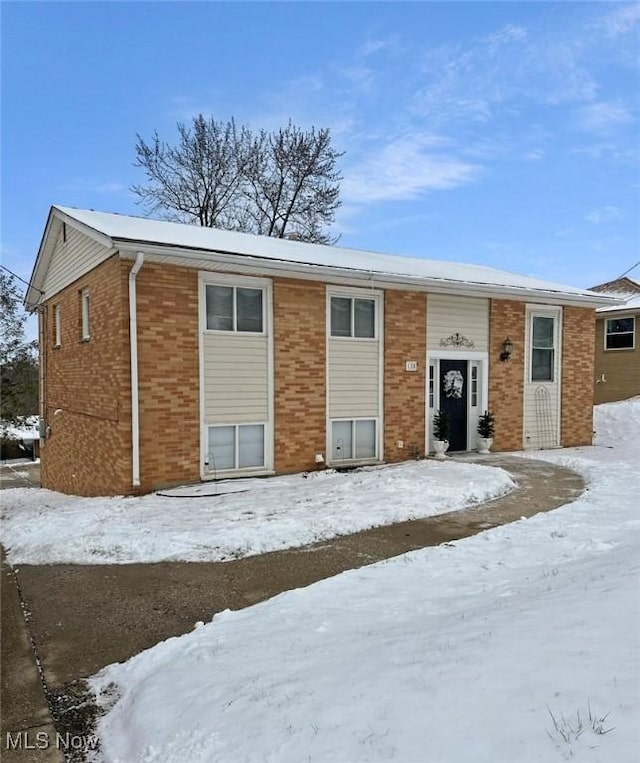 view of snow covered property