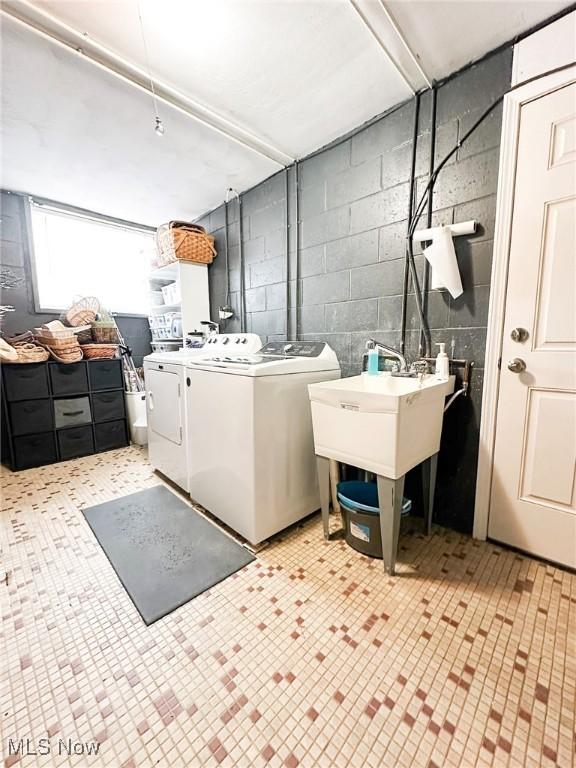 laundry room featuring separate washer and dryer