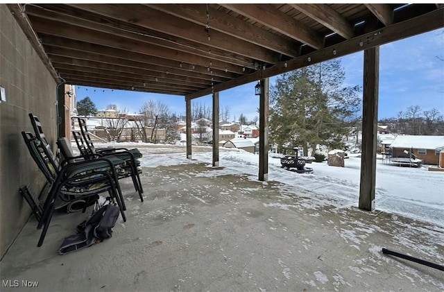 view of snow covered patio