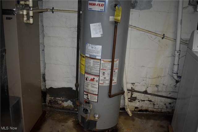 utility room with gas water heater