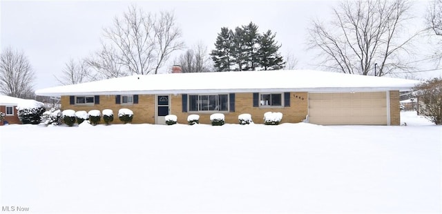 single story home with a garage