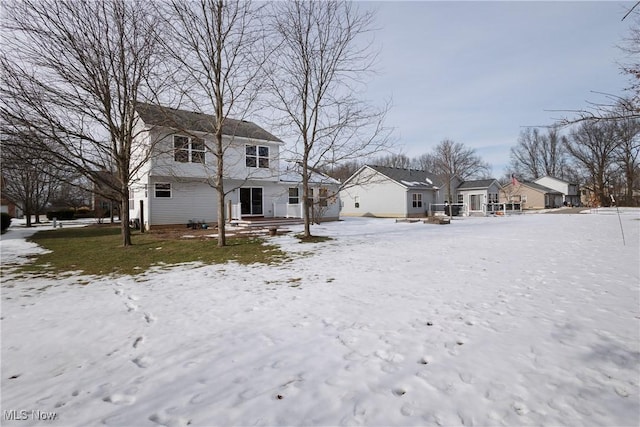 view of snow covered property