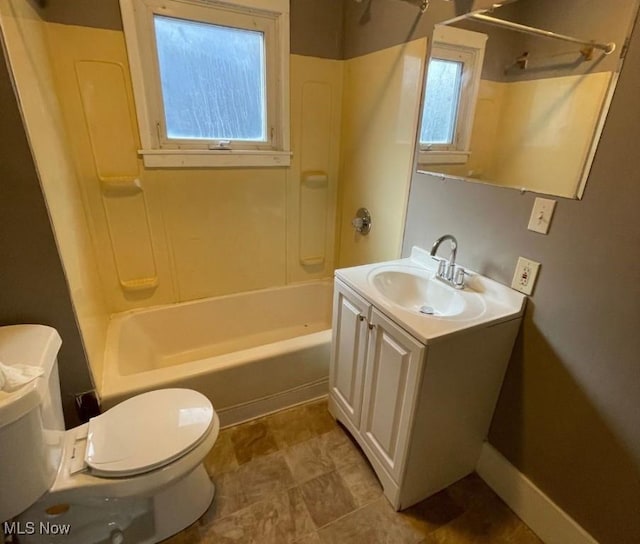 full bathroom with vanity, toilet, and shower / washtub combination