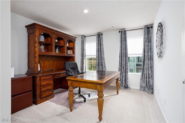 home office featuring light colored carpet