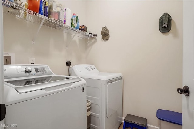 laundry area featuring washer and clothes dryer