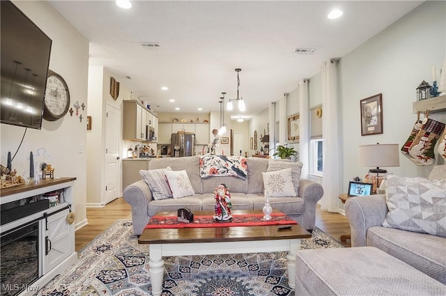 living room featuring light hardwood / wood-style flooring