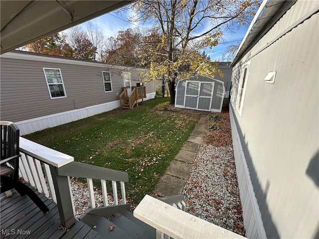 view of yard with a storage shed