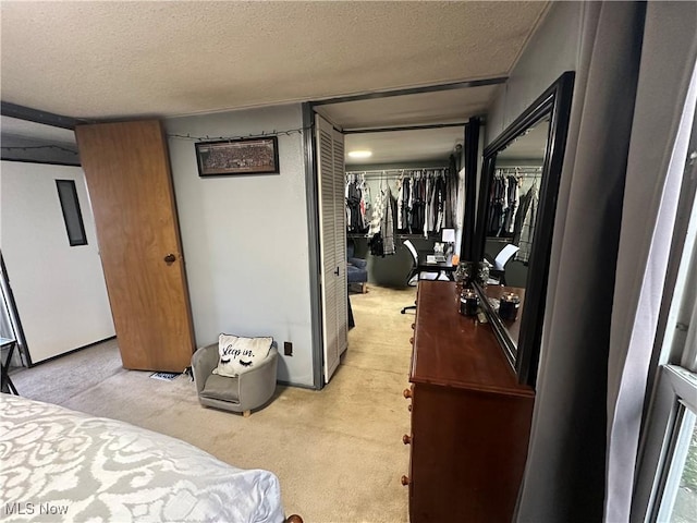 bedroom featuring a closet and a textured ceiling