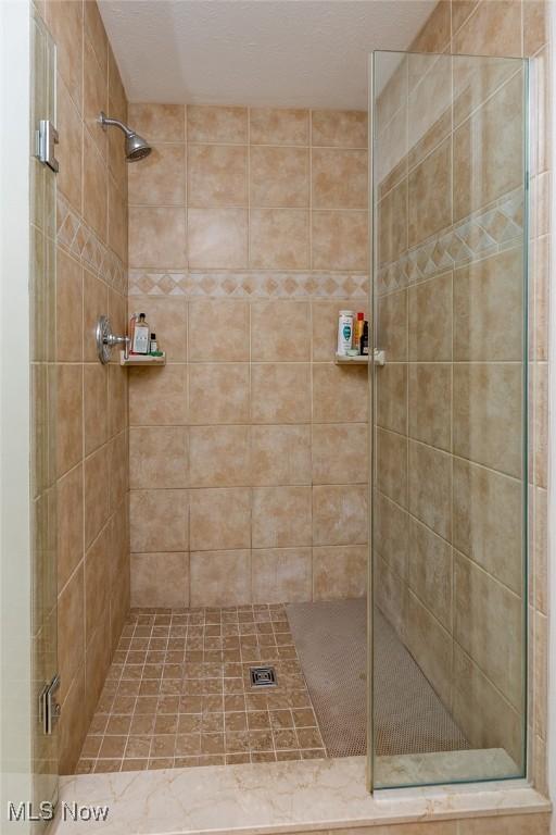 bathroom with an enclosed shower