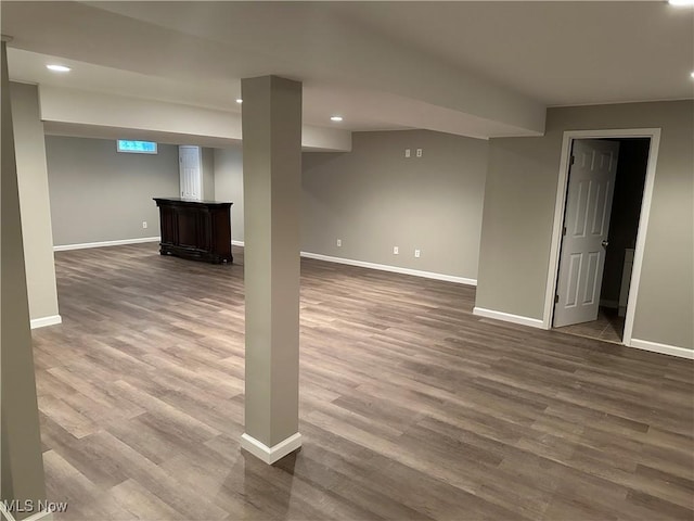 basement with wood-type flooring