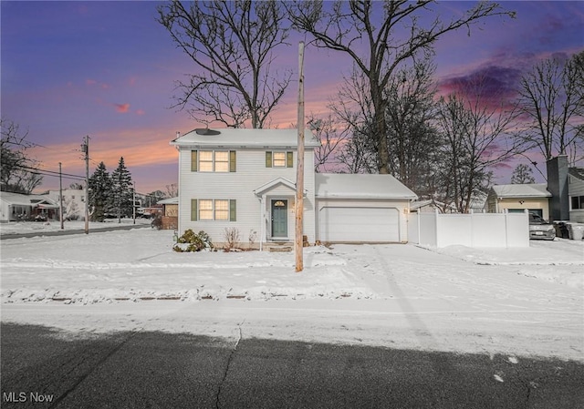 view of front of home with a garage