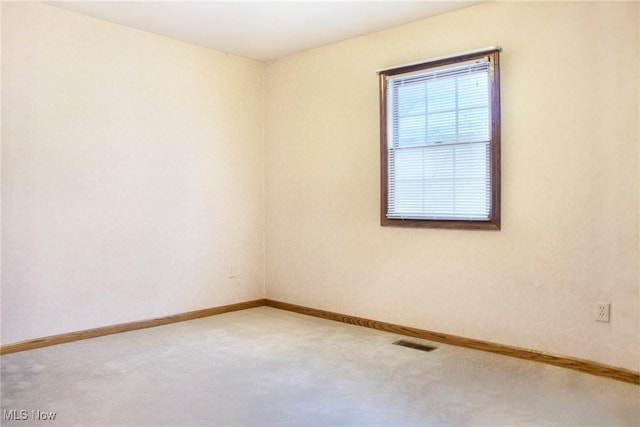 view of carpeted spare room