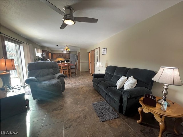 living room with ceiling fan