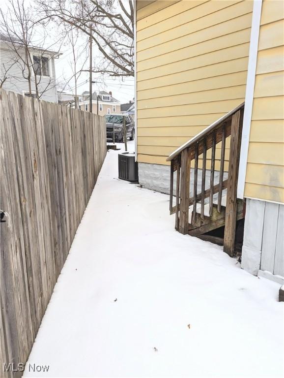 exterior space featuring a deck and cooling unit