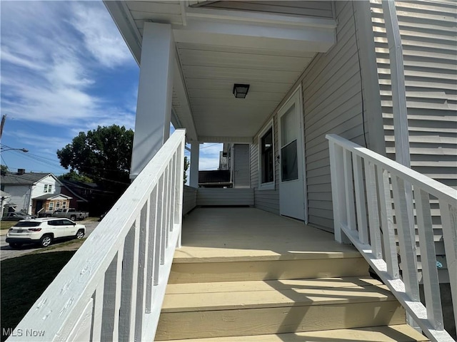 balcony featuring covered porch