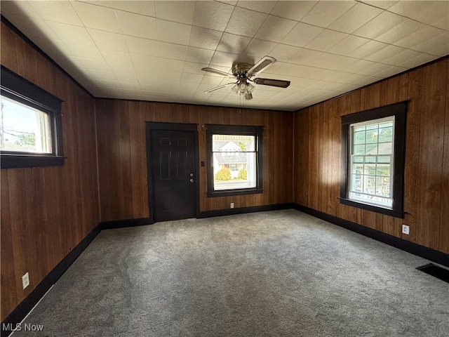 carpeted empty room with ceiling fan