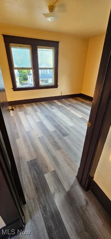 empty room featuring hardwood / wood-style flooring