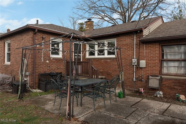 rear view of property with a patio area