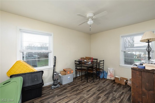 misc room featuring dark hardwood / wood-style floors and ceiling fan