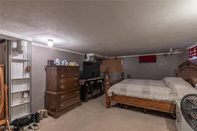 carpeted bedroom featuring a textured ceiling