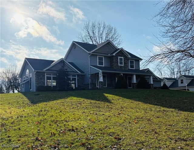 view of front facade featuring a garage and a front yard