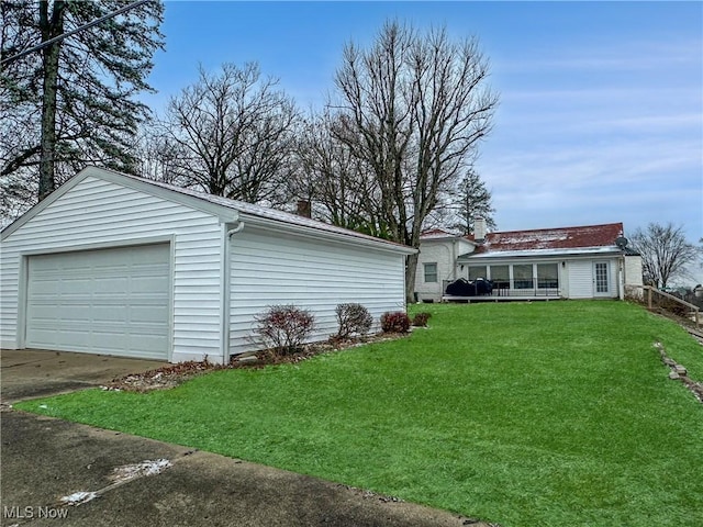 exterior space with an outdoor structure, a porch, and a garage