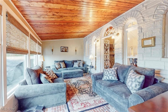 living room with wood ceiling and vaulted ceiling