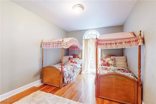 bedroom featuring hardwood / wood-style floors