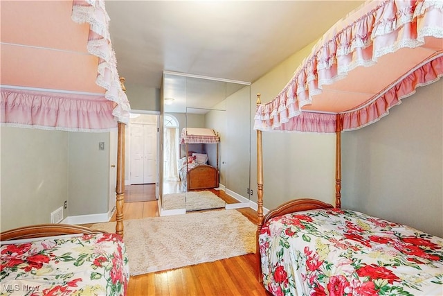 bedroom featuring hardwood / wood-style floors